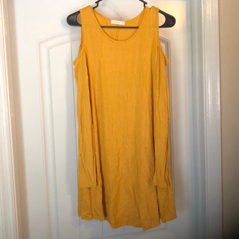 Cold shoulder long sleeve tunic.